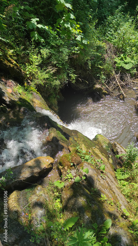 mountain river with stones and fast current