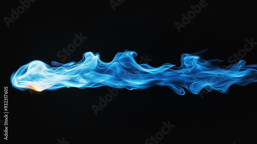 Abstract image of blue flame flowing horizontally against black background with wisps of translucent smoke trailing behind. Dynamic movement emphasize energy, heat and motion in captivating visual