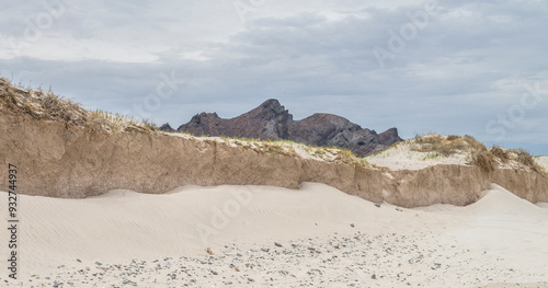 Tecolote Beach, La Paz Baja California Sur. Mexico, on a cloudy summer morning, by the sea of cortes. with dunes and mountains in the background