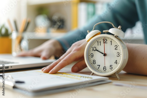 Mastering Time: Hand adjusting analog clock in serene home office setting with planner and to-do list, emphasizing effective time management and productivity.