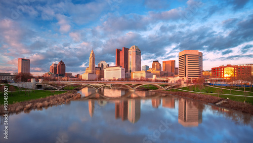 Columbus, Ohio, USA. Cityscape image of Columbus, Ohio, USA downtown skyline with the reflection of the city in the Scioto River at spring sunset.