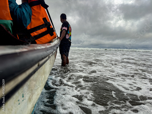 boatman in pacific ocean