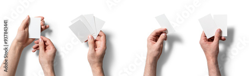 Two hands display blank cards in varying configurations, suggesting a brainstorming session or game preparation while set against a stark white backdrop