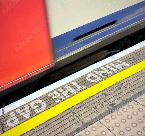 mind the gap sign at London tube floor