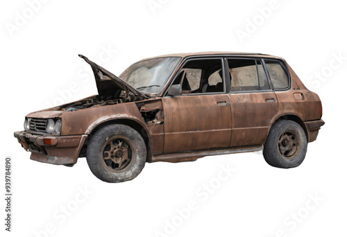 An abandoned rusted car isolated on white background with clipping path.