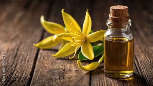 a small bottle of ylang ylang essential oil iso background