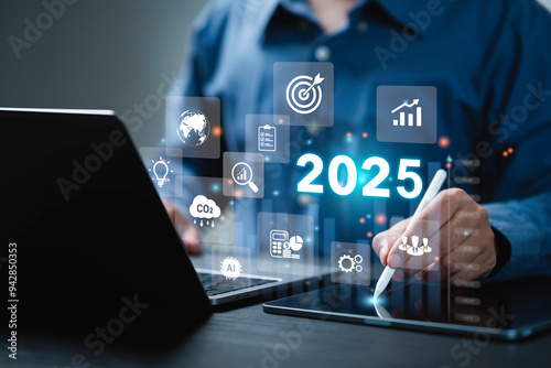 Businessman plan strategy marketing and finance to goal in 2025 planning business growth with technology AI and environmental care to New Year resolutions business. digital transformation 2025