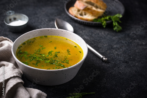 Chicken broth with parsley, healthy food