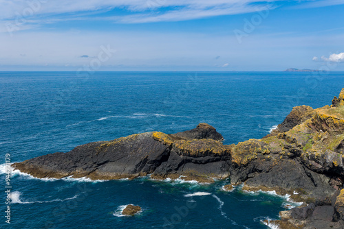 Offshore rocks and cliffs in the Irish Sea next to Skomer Island, Pembrokeshire, Wales