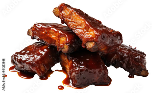 PNG Slow cooked racks of pork ribs with a sticky BBQ sauce covering bbq grilling cooking.