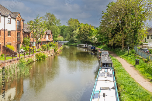 Narrowboats mowed on the Leeds Liverpool canal at Parbold in Lancashire