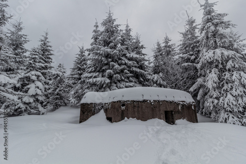 Winter view of a concrete pillbox from the WW2, Czech Republic