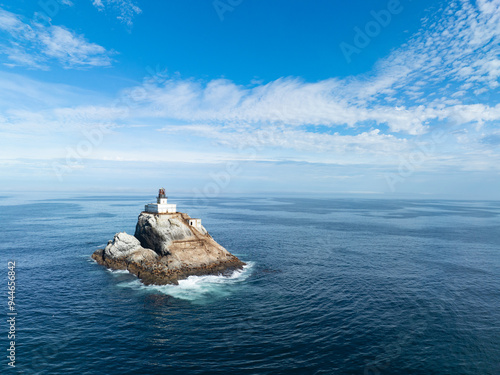 A deactivated lighthouse stands on Tillamook Rock off the rugged coast of northern Oregon. Originally commissioned in 1878, the remote lighthouse eventually earned the name "Terrible Tilly."