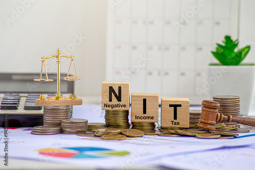 NIT Wooden blocks with words 'NEGATIVE INCOME TAX'. Business concept