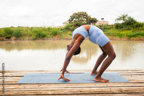 Yoga stretch and meditation outdoors in the countryside