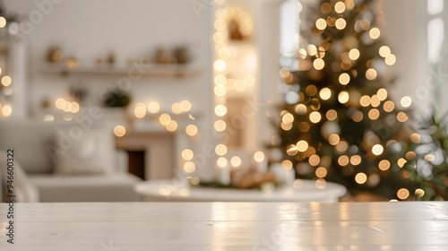 Blurred christmas tree and fireplace background on empty wooden tabletop, ideal for showcasing holiday season products