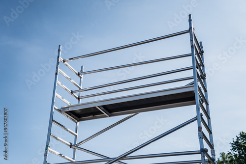 Aluminum scaffolding towers. Lightweight scaffolding metal equipment for lifting and access higher places