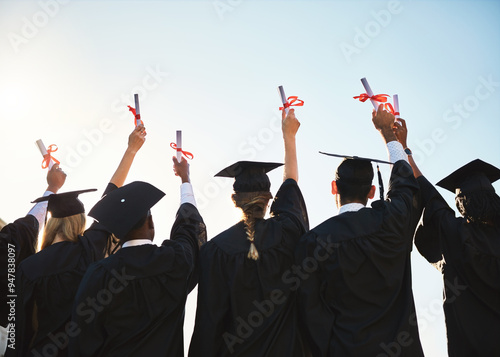 Graduation, diploma or back of students with degree at university for education, opportunity or success. Sky, scholarship or group of proud people with college certificate, hands up or achievement