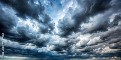 Cloudy overcast sky with clouds flying over the horizon, creating a dramatic cloudscape