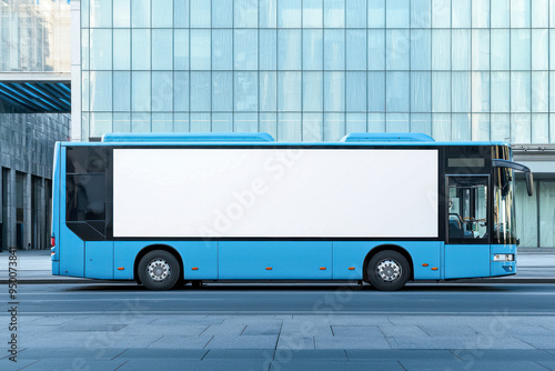 Side view of a blue city bus with a large blank white mockup area.