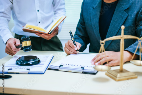 Two lawyers consult in a modern office, presenting compelling arguments and demonstrating their expertise, trying to win a case with their legal acumen and persuasive skills. 