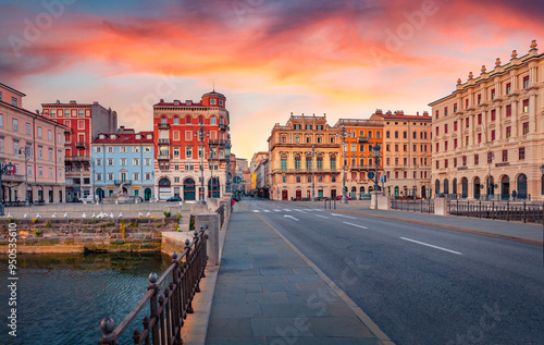 Stunning morning cityscape of Trieste town, Italy, Europe. Exciting summer sunrise on Piazza del Ponte rosso Town square. Traveling concept background.