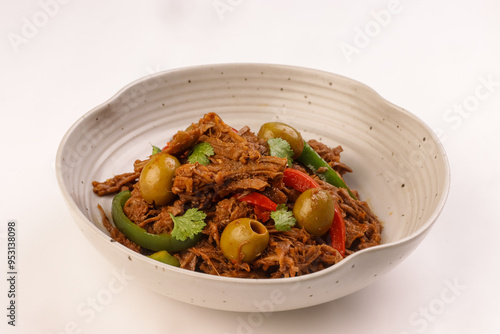 Ropa Vieja is Cuban Style Shredded Beef, Braised Beef in Cuban Style Sauce.