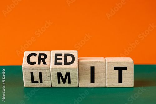 Credit limit Icon. Wooden cubes and changes the word 'limit' to 'credit'. Beautiful Orange green background, copy space. Business concept and credit limit symbol.