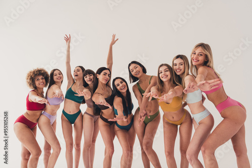 No filter photo of group pull hands invite strip tease show wearing only underwear isolated on white color background