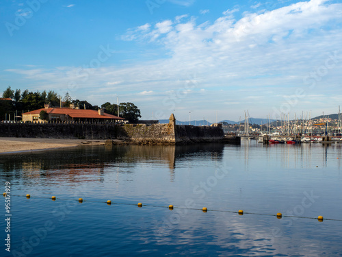 Partial view of the fortress attached to the sea of ​​Monterreal Castle, in the town of Baiona. Rias Baixas, Galicia, Spain.