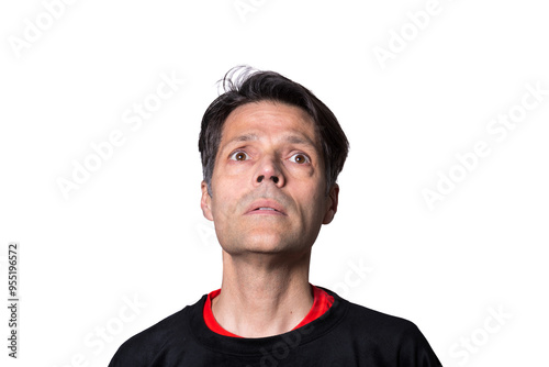 Middle-aged man looking up with distressed expression, on white background, wearing casual clothes.