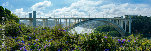 Panoramic view of the white and modern bridge over Douro (Duero) river in Porto - Ponte da Arrabida