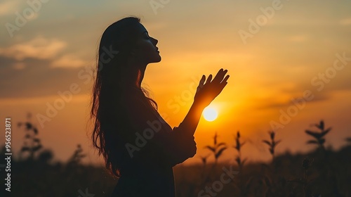 Silhouette of prayer woman worship God in the morning with sunrise sky background Person hands open palm up worship God helping repent catholic easter lent mind pray Christian religion : Generative AI