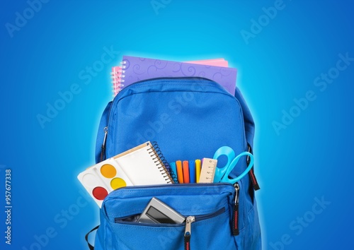 School backpack containing set of supplies.