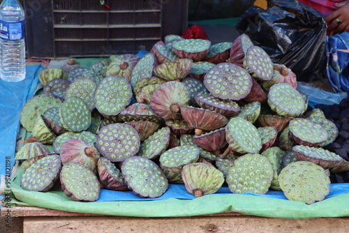 water lily fruits, lotus seeds at market for sale 