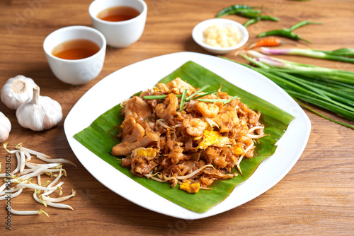 Penang Char Kway Teow or fried noodle with prawns, popular cuisine in Malaysia. Penang famous traditional street food.