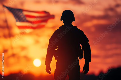 Silhouette of a soldier standing against a sunset background with an American flag, symbolizing patriotism and honor.