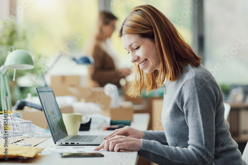 E-commerce employee working in the office