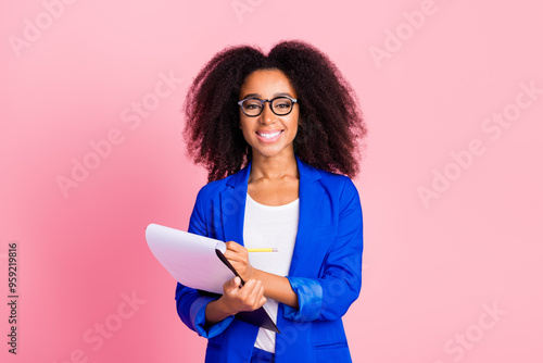 Photo of lovely nice woman wear stylish blue clothes hold planner isolated on pink color background