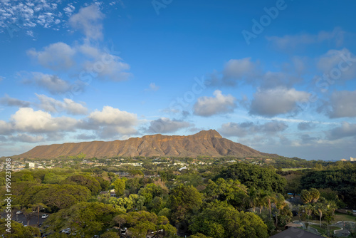 Scenic view of Diamond Head crater in Honolulu, Hawaii, USA on the island of Oahu against blue sky with clouds