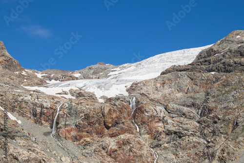 Majestic Mountain Glacier with Waterfalls