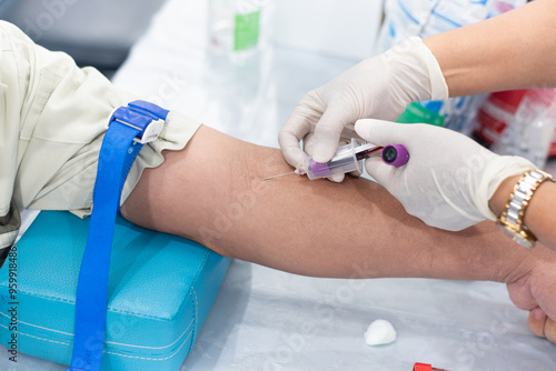 Blood sample from a vein, Nurse taking Real Blood samples analysis from a vein of the patient, laboratory on research of blood tests, to diagnose illness by means of a blood test