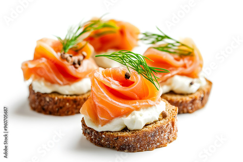 Canapes with red salmon and cream cheese isolated on white background