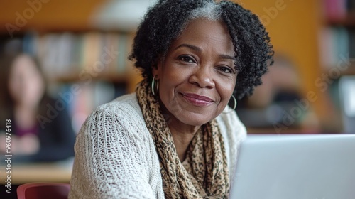 Sincere African-American woman with glasses, in a library or educational setting