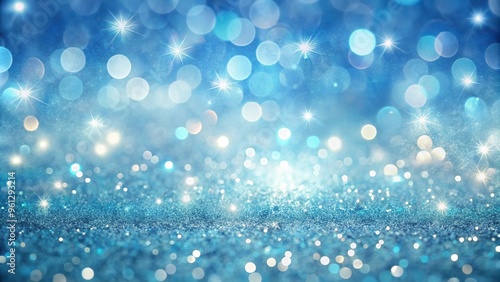 Asymmetrical pale blue glitter defocused twinkly lights resembling a quiet meadow