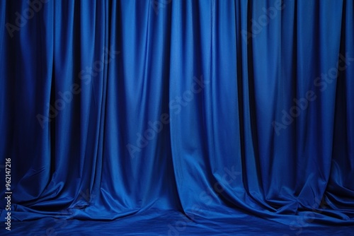 Elegant blue theater curtain background with luxurious drapery folds