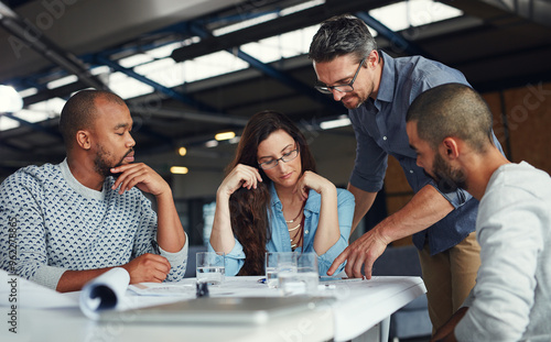 People, architecture and meeting at tablet for planning, feedback or project management. Team, communication or man leader at table with tech for proposal, design or advice for urban development