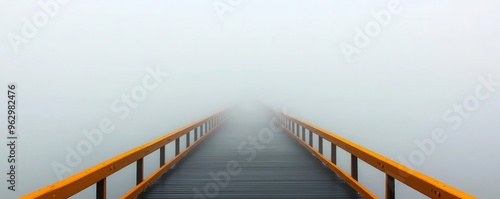 A fogcovered bridge with no visible end in sight, uncertainty, crossing into the unknown