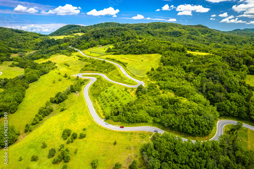 Serpentine road therough Kalnik mountain aerial view