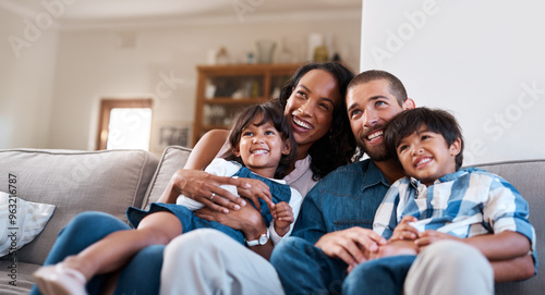 Happy, TV and parents with kids in home for bonding, relax and watching movies in living room on sofa. Laugh, family and mom, dad and children on couch streaming cartoons, entertainment and series